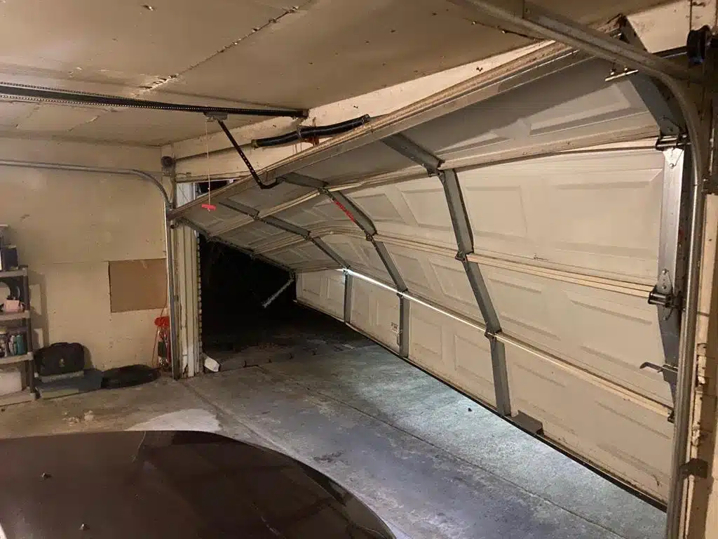 Damage from a garage door being off track. garage door repair in Cape Coral