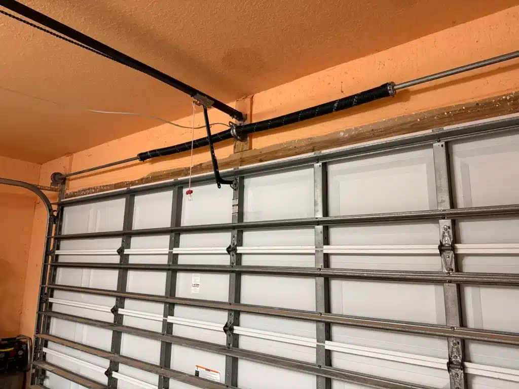 Broken torsion spring on residential garage door in Cape Coral, FL